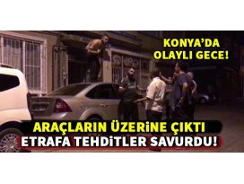 Alkollü şahıs araçların üzerine çıkarak kendini kesmek istedi